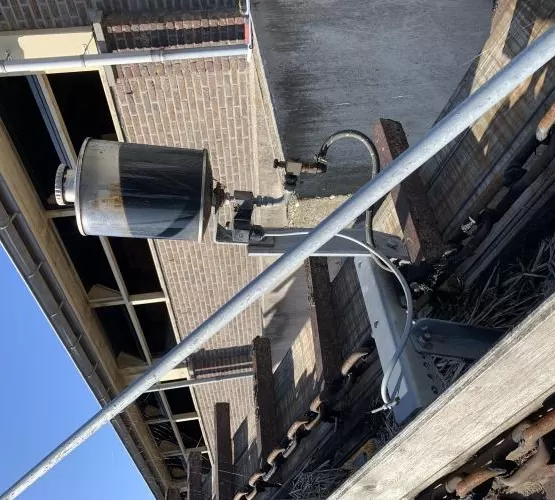 Automatische kettingsmering op de gebruikte transporteur